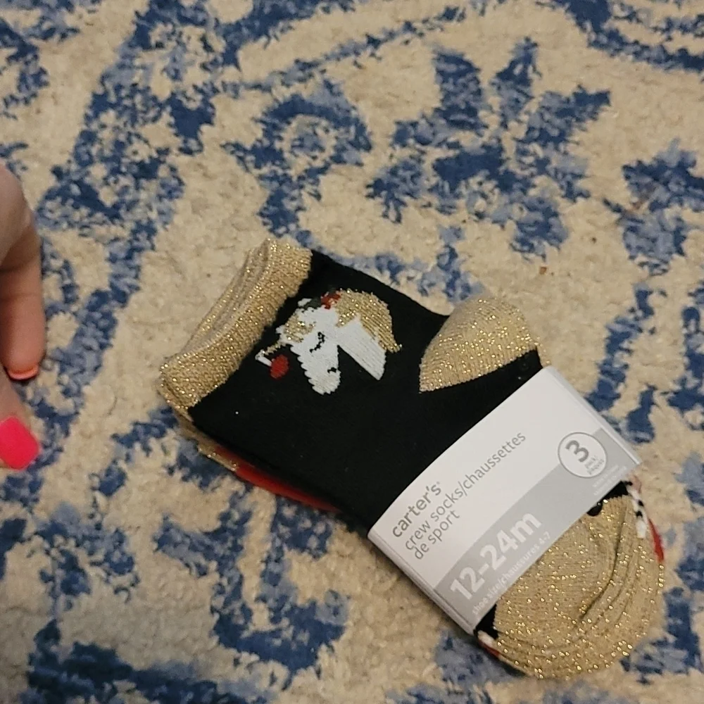 Carters sz 12-24 months unicorn Christmas socks. Free with kid bundle purchase!